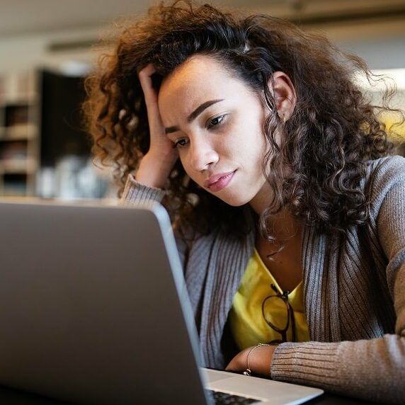 student struggling with procrastination and not being able to start her university assignment (ADHD procrastination)